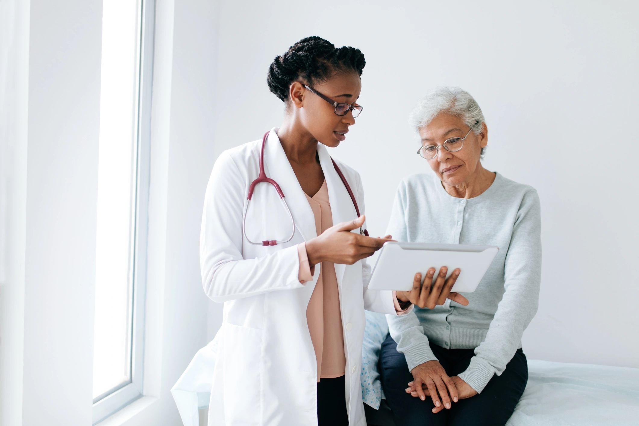 Doctor reviewing treatment information with patient