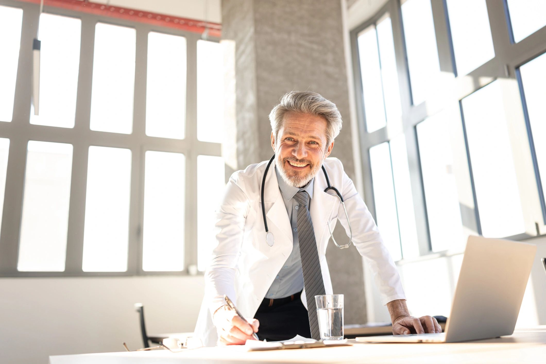 Board-certified physician in a modern medical office